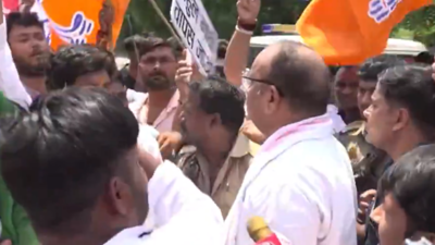 Bjp minister dinesh pratap singh protests against rahul gandhi.jpg