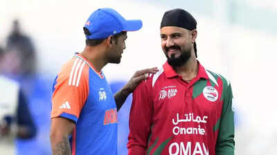 India captain greets oman counterpart pti photo.jpg