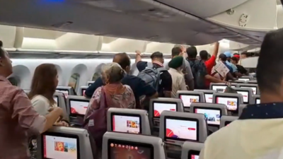 Passengers deplaned from air india39s singapore bound plane at delhi airport.jpg