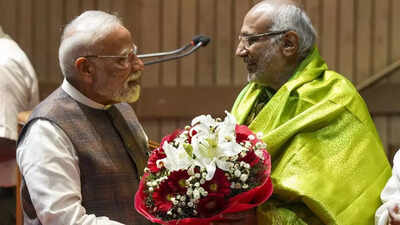 Pm modi congratulates cp radhakrishnan ani photo.jpg