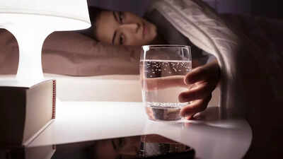 This common habit of keeping water on your bedside table may put your health at risk.jpg
