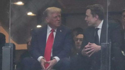 Trump with musk during kirk memorial.jpg