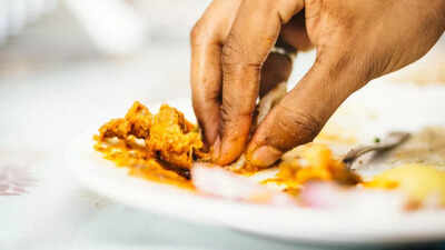 Why eating with your hands could be the natural cure for bloating and slow digestion.jpg