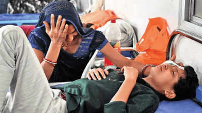 11 year old sinu verma with his mother babita verma at sewa sadan eye hospital in bhopal on friday.jpg