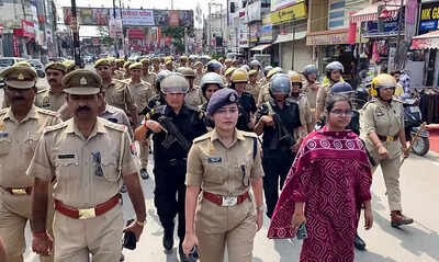 Bareilly oct 2 ani bareilly sp south anshika verma leads a police flag march.jpg