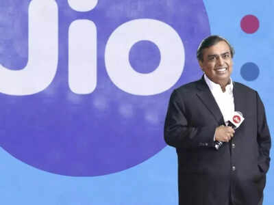 File image mukesh ambani chairman and managing director of reliance industries with jio logo in the background.jpg