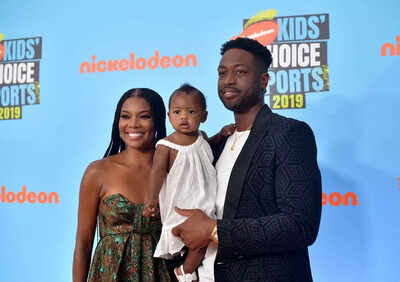 Gabrielle union and dwyane wade with daughter kaavia.jpg
