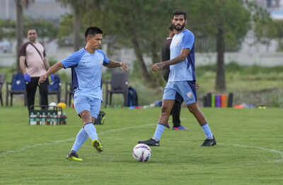 Sunil Chhetri IN! Coach Khalid Jamil names India’s 23-member squad for Asian Cup Qualifiers against Singapore | Football News Kolkata men39s national soccer team player sunil chhetri with teammate subhasish.jpg