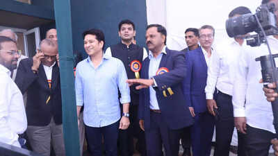 Sachin tendulkar and pravin amre.jpg