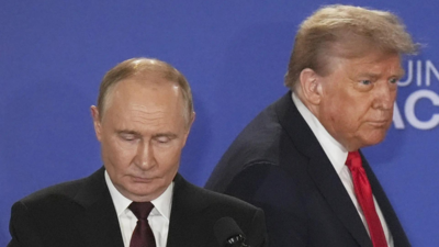 Vladimir putin left donald trump ap.jpg