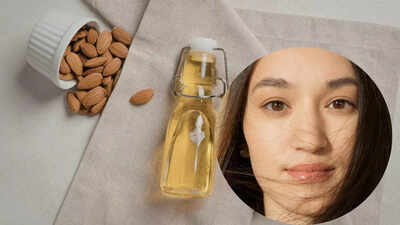 Almond oil for skin and hair natural beauty benefits hair growth and glowing skin.jpg
