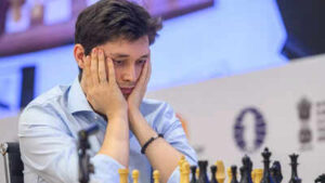 Gm andrey esipenko in deep thoughts during his match against nodirbek yakubboev for the third candidates spot at the fide world cup goa 2025 credit michal walusza fide 1.jpg