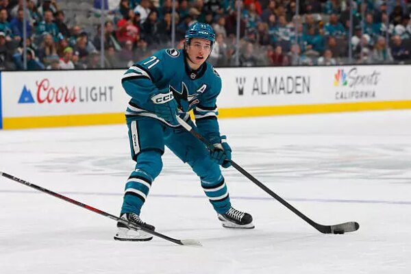 Nhl san jose sharks center macklin celebrini looks to pass the puck during the nhl game between the florida panthers and the san jose sharks.jpg