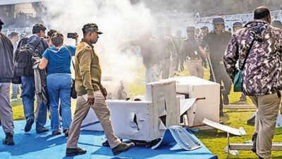 At around 1210 pm barely 18 minutes after the star had exited fans started crossing the barriers and entered the ground some were lathicharged by the police that didn39t stop the flow.jpg