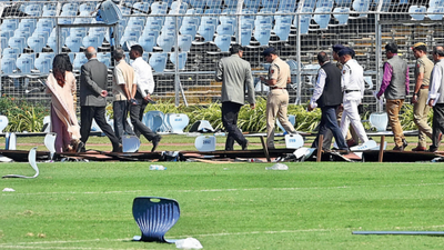 Members of the team investigating saturdays mayhem inspect salt lake stadium on sunday.jpg