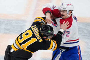 Old rivals bruins canadiens drop gloves at opening faceoff in matchup of east conference foes.jpg