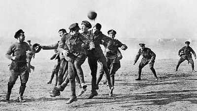 Soldiers playing football in no man39s land a year after the christmas truce in 1914 photo credit universal history archiveuiggetty images.jpg