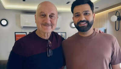 Anupam kher and rohit sharma.jpg