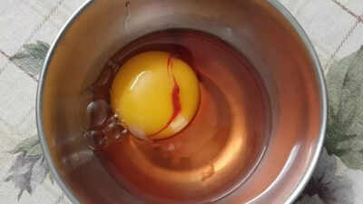 Ever cracked an egg with a red egg white heres what it means and how to spot unsafe eggs.jpg