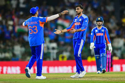 Colombo sri lanka feb 15 ani india39s axar patel with skipper suryakumar y.jpg