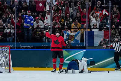 Nhl brad marchand of canada celebrates scoring his team third goal during milano cortina 2026 winter olympics.jpg