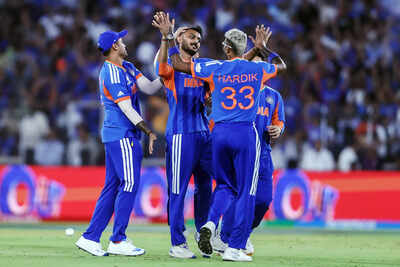 1774282881 ahmedabad mar 08 ani india39s axar patel and teammates celebrate the wicket o.jpg
