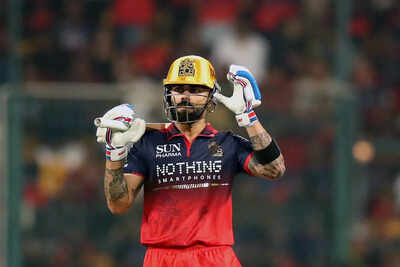 Bengaluru mar 28 ani rcb batter virat kohli celebrates his half century duri.jpg