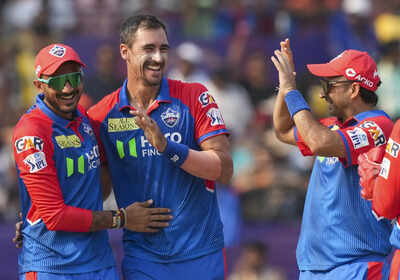 Visakhapatnam delhi capitals mitchell starc center celebrates with captain a.jpg