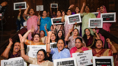 Bjp mps protested against the opposition after the women quota bill failed in lok sabha.jpg