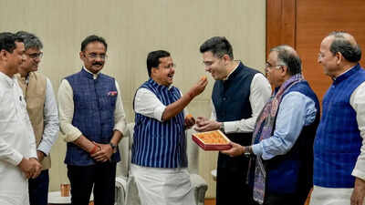 Raghav chadha and other ex aap mps with bjp president nitin nabin.jpg