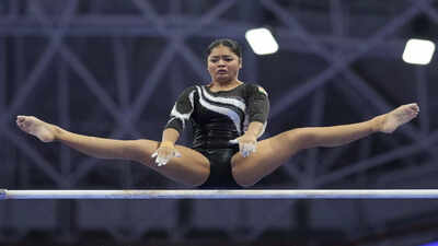 Pranati nayak of india competes on the balance beam at the women39s team artistic.jpg