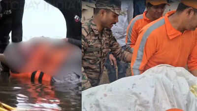 Rescuers said both were wearing life jackets but the child remained tightly held against the mother.jpg