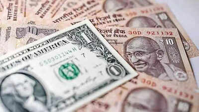 Rupee recovers from record low rises 21 paise to 86.jpg