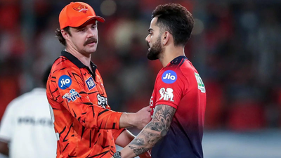 Travis head and virat kohli.jpg