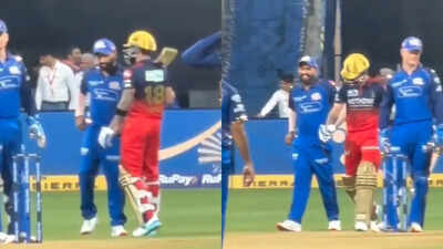Virat kohli cracks rohit sharma up during rcb vs mi clash screengrabs.jpg