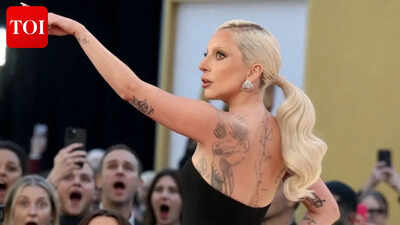 Lady gagas tattoos decoded the emotional symbolism behind her roses music notes and german tribute ink.jpg