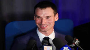 Nhl john chayka speaks to media at a press conference he was announced as general manager.jpg